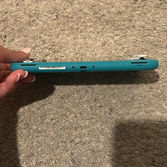 Teal Nintendo Switch Lite with matching Nintendo Animal Crossing Carrying Case - Picture 3 of 7